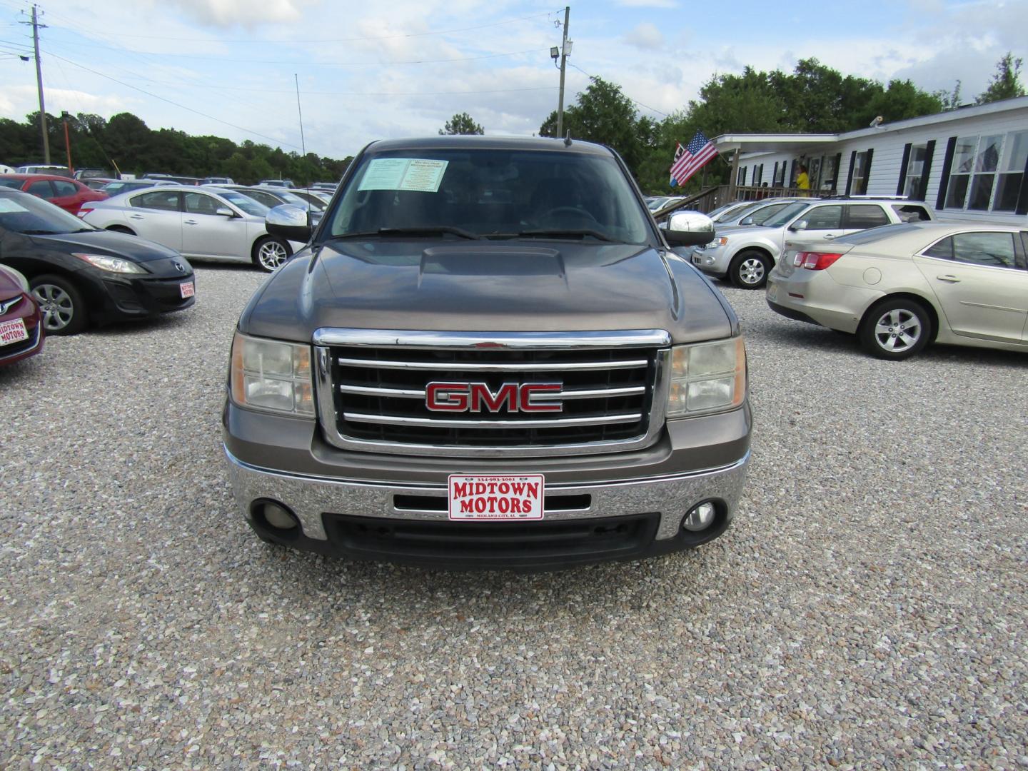 2012 Bronze /Tan GMC Sierra 1500 SLE Ext. Cab 2WD (1GTR1VE04CZ) with an 5.3L V8 OHV 16V FFV engine, Automatic transmission, located at 15016 S Hwy 231, Midland City, AL, 36350, (334) 983-3001, 31.306210, -85.495277 - Photo#1